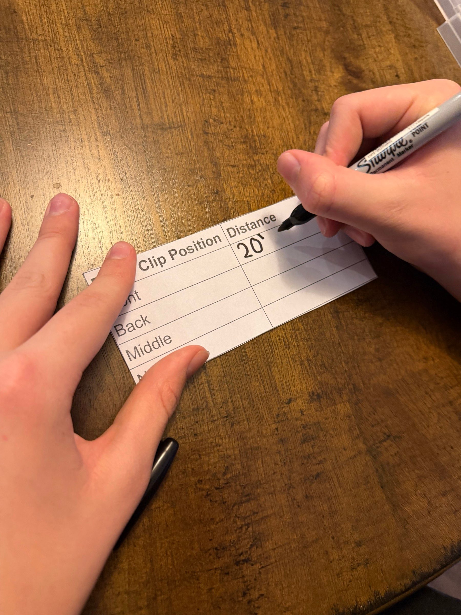 Students recording data
