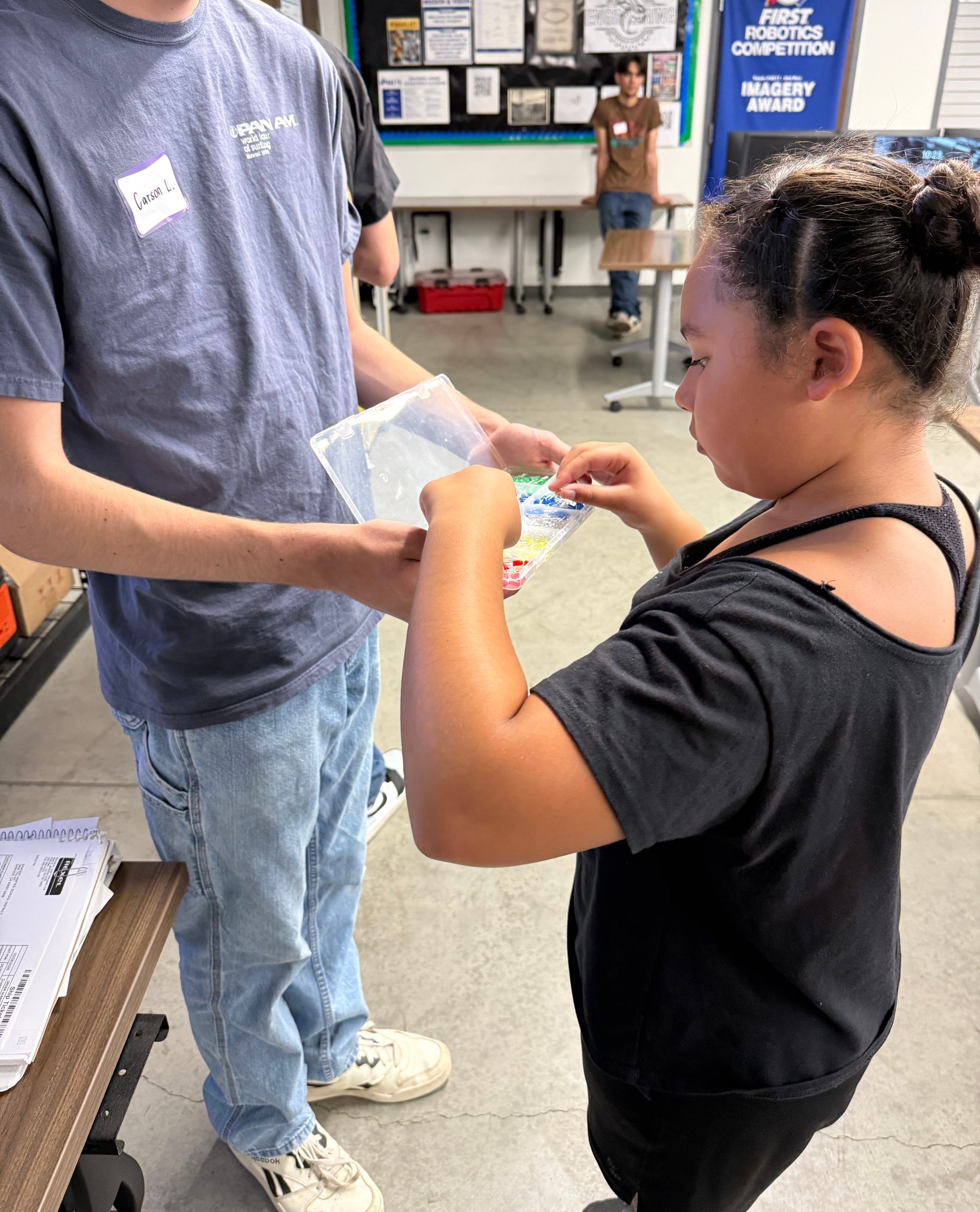 Student collecting circuit materials