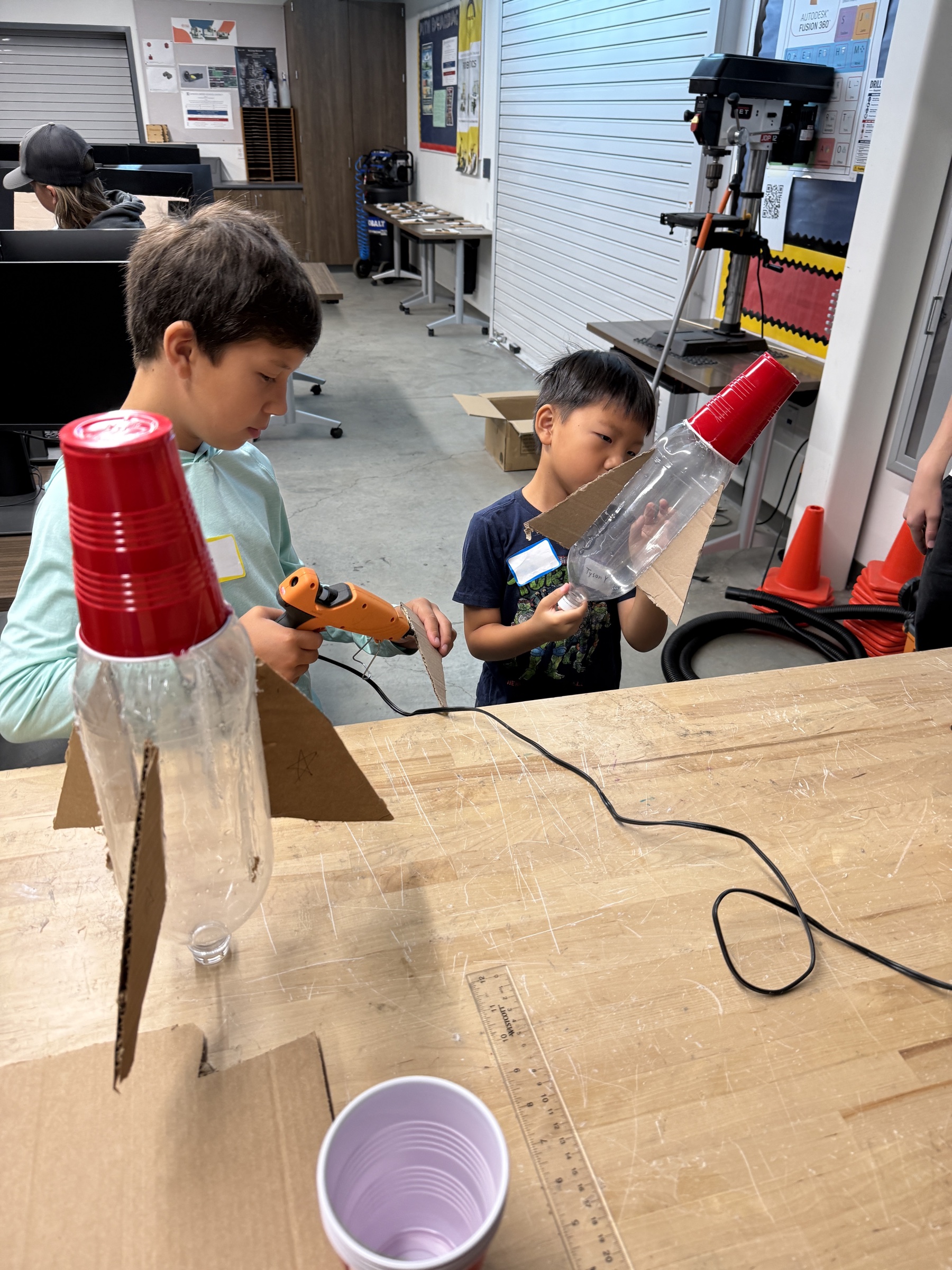 Students building bottle rockets
